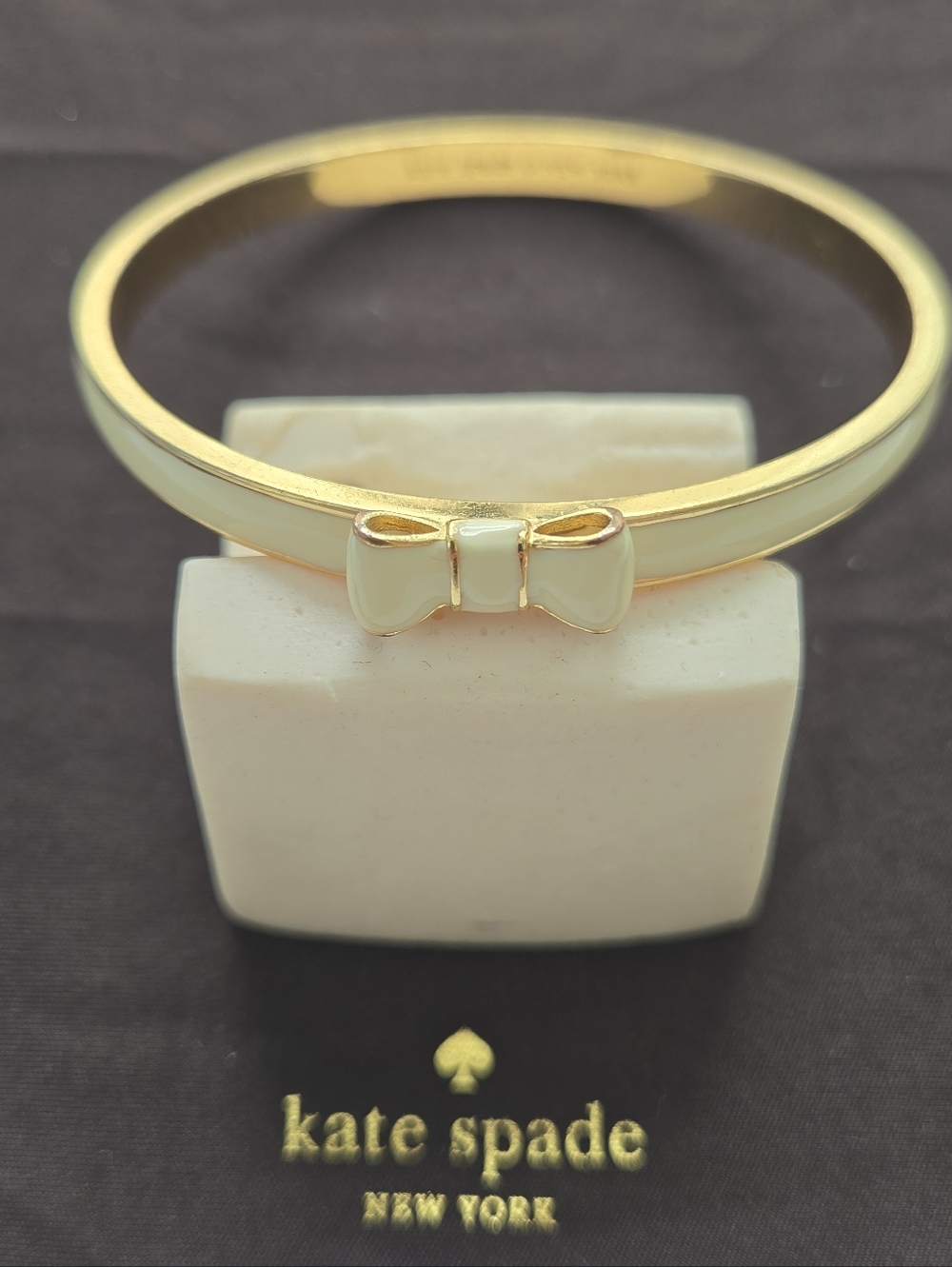 kate spade "Take A Bow" Cream Bangle W/Gold Accents